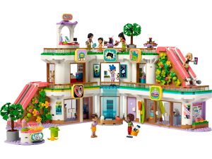 inspire kids to create friendship stories with this shopping centre playset it includes 7 lego friends characters 5 shops and 2 working lifts 42604